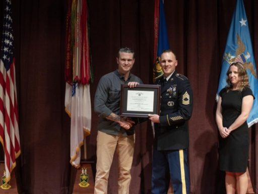 Secretary of Defense personally recognizes the heroic actions of Soldier