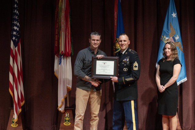 Secretary of Defense personally recognizes the heroic actions of Soldier