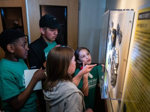 Teens immerse in military history while staying in Army museum for night of excitement, adventure